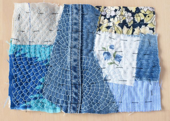 Sticken Sie über die Stoffreste