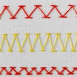 Chevron stitch embroidery - three rows of stitches in red and yellow Chevron stitch embroidery - three rows of stitches in red and yellow
