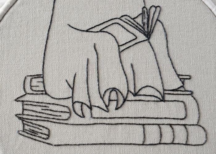 Lesegeist umrandet mit geteiltem Rückstich